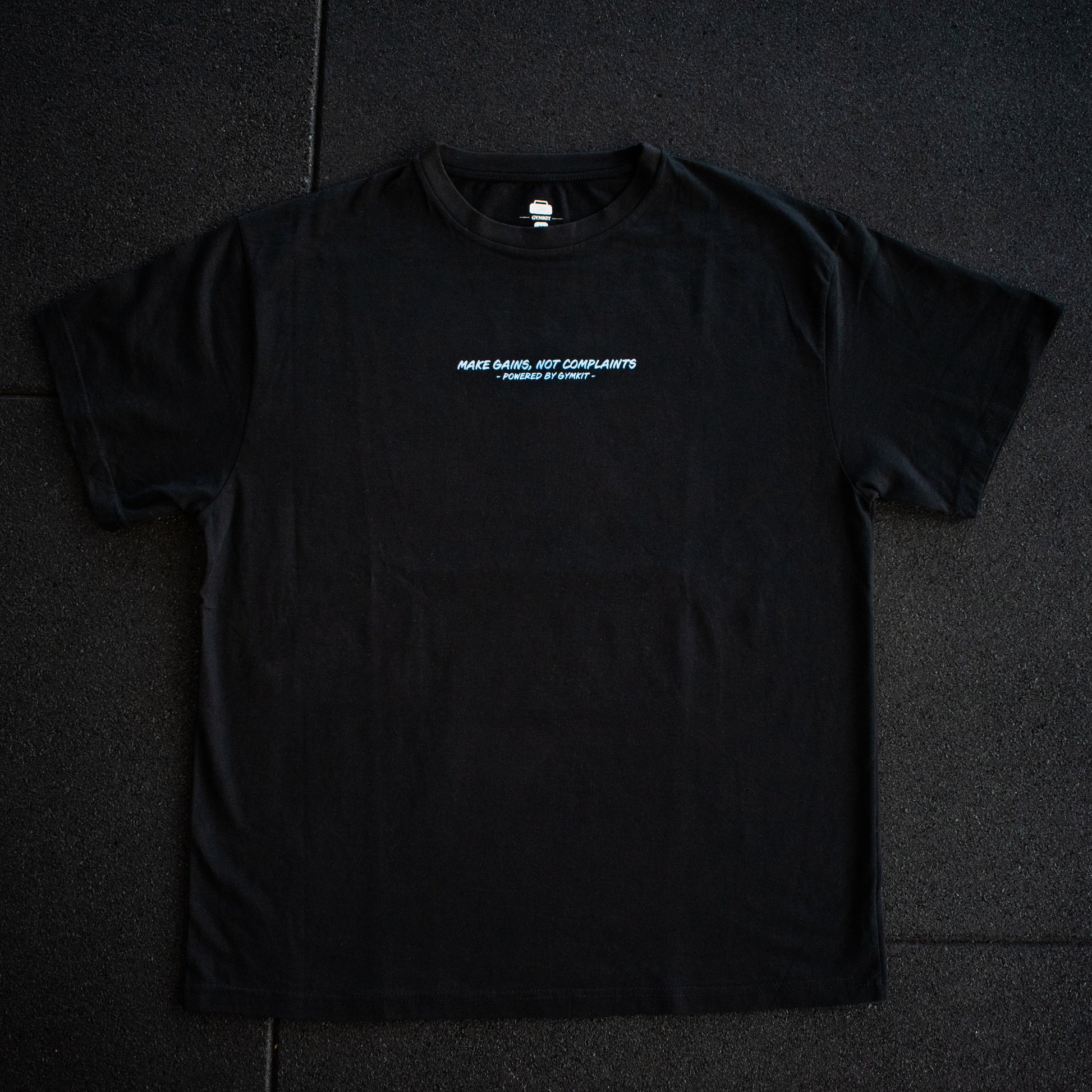 Black t-shirt with white text on a dark background