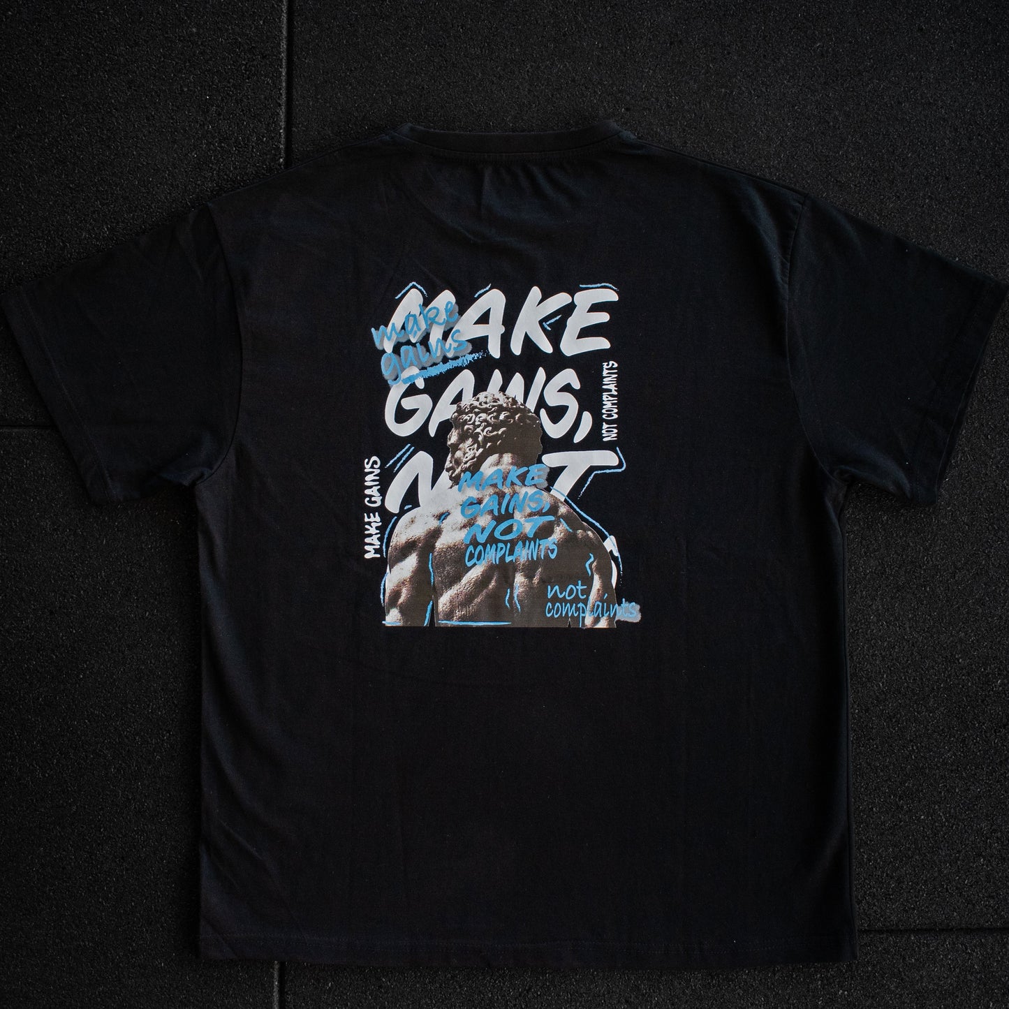 Black t-shirt with graphic design and text on a dark background