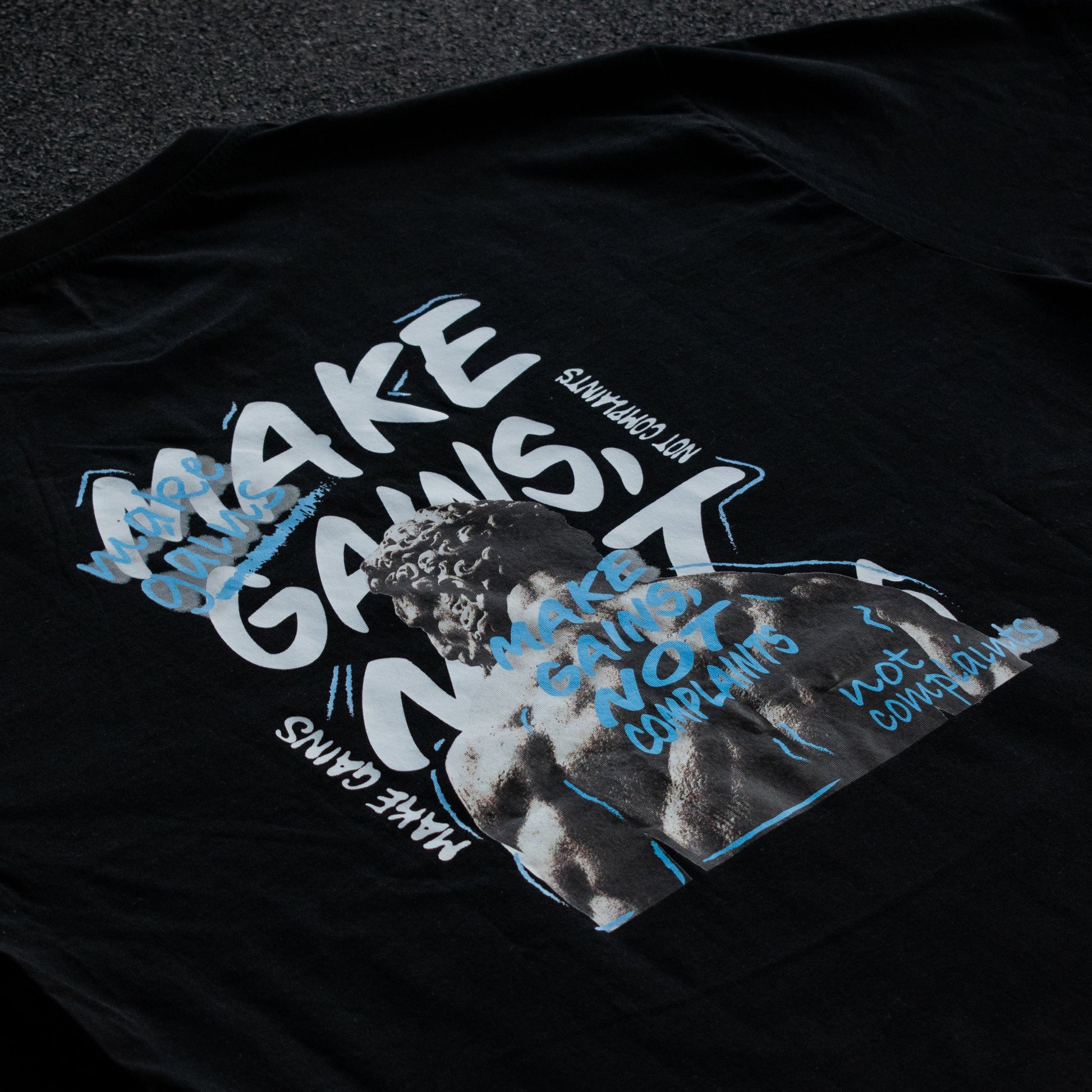 Black t-shirt with graphic design and text on a dark background